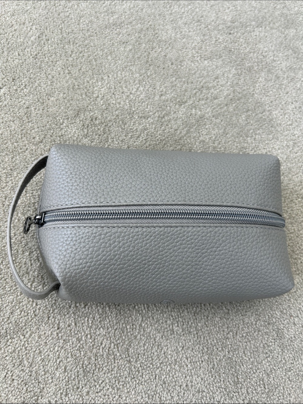 Therabody Grey Pebbled Leather Travel Pouch from United Airlines